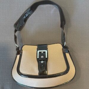 Tod's Black and Tan Shoulder Bag with Flap Closure